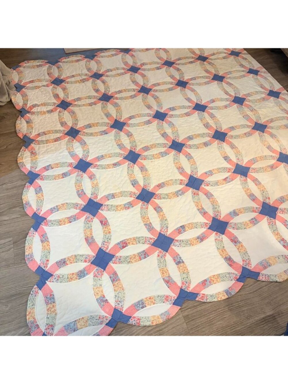 Vintage handmade pastel floral pink and blue wedding ring quilt blanket